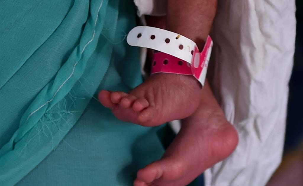 6-Hour-Old Girl, Buried Alive, With Umbilical Cord Intact, Is Recovering