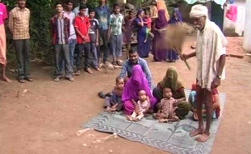 A Liquor Bottle - Tantrik’s Fee To ‘Treat’ Malnourished Children In Madhya Pradesh